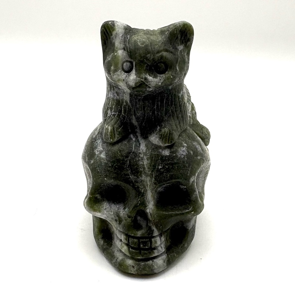 Serpentine Crystal Cat perched on Skull Carving 2.5”